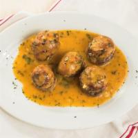 Stuffed Mushroom · With crabmeat in a scampi sauce.