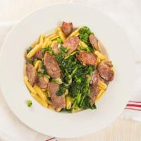 Cavatelli Gusto · Cavatelli pasta, sausage and broccoli rabe sautéed in garlic and oil.