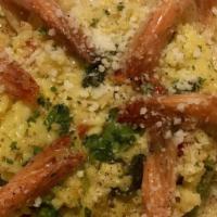 Shrimp Scampi Risotto · Fresh asparagus, roasted red peppers, Parmigiano-Reggiano.
