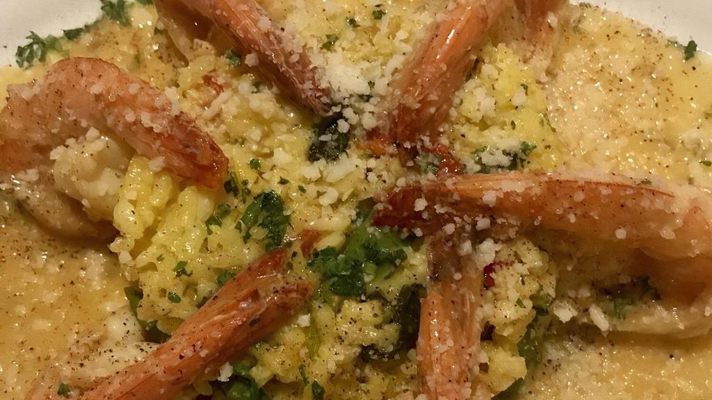 Shrimp Scampi Risotto · Fresh asparagus, roasted red peppers, Parmigiano-Reggiano.
