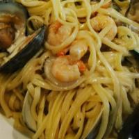 Seafood Linguini · Shrimp, mussels, scallops, clams in red or white sauce.