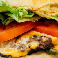 Classic Burger · 1/4 POUND USDA Prime Signature Blend, Lettuce, Tomato, Pickles, House Sauce and American Che...