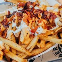 Chipotle Fries · Burgerology’s Hand Cut Fries topped with Chipotle Mayo, Ranch and Bacon Bits.