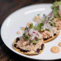 Tostadas De Cangrejo · Crabmeat in crispy corn tortilla, avocado chipotle aioli, pico de gallo.