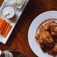 Buffalo Wings · A classic favorite! 
Served with a side of pickled white mu radish. Add on our house-made bl...