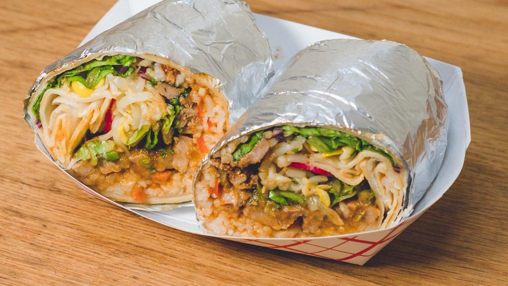 Spicy Pork Burrito · Berkshire pork shoulder 
sautéed with our spicy house-made
Korean BBQ sauce, wrapped in a flour tortilla with rice, three bean chili, bean sprouts, lettuce, soy dressing, and radish