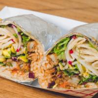 Fish Burrito · Lightly battered whiting, wrapped in a flour tortilla with rice, three bean chili, bean spro...