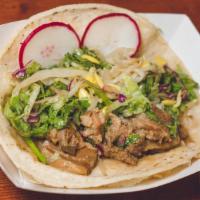 Pork Belly Taco · Soy braised Berkshire 
pork belly served on corn tortillas with bean sprouts, red leaf lettu...