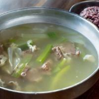 Kalbitang (Call-Bee-Tong) · Beef short ribs soup with onions, oyster mushrooms, sliced radish, cellophane noodles and egg.