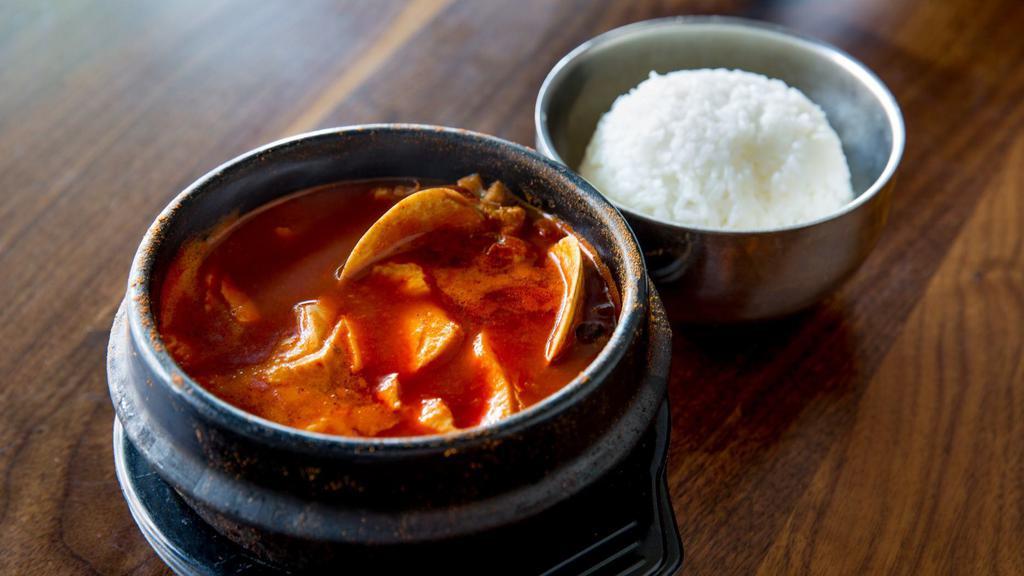 Soondubu (Soon-Doo-Boo) · Medium spicy and vegan. Spicy and savory  stew with silken tofu. Your choice of seafood (shrimp, squid, and clams) or vegan option.