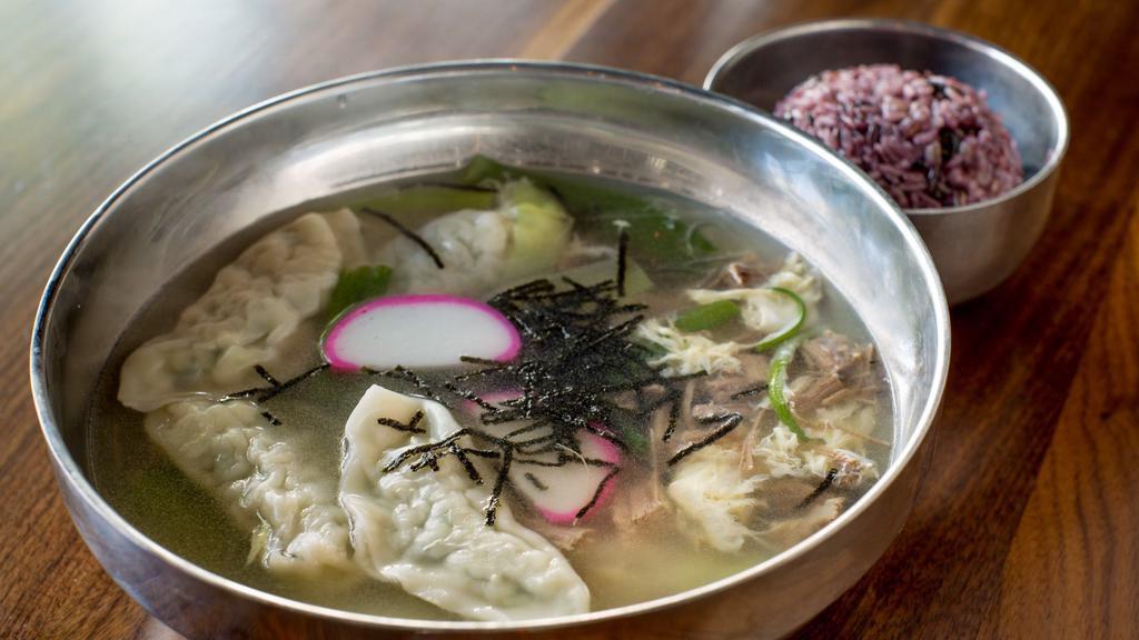 Ttuckmandoo Guk (Tuck-Mohn-Doo) · Pork or veggie mandoo (dumplings), rice cakes, egg drop and cellophane noodles in a beef broth. Does not come with rice.