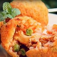 Arancini With Meat · Arancini are Italian rice balls that are stuffed with our beef bolognese,  coated with bread...