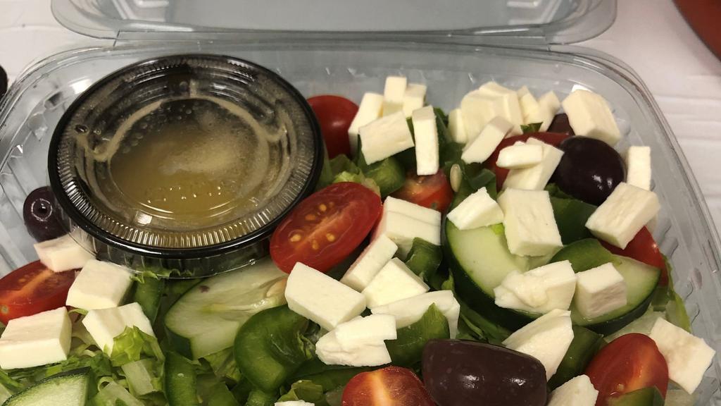 House Salad · Romaine Lettuce, Kalamata Olives, green peppers, red onions, cherry tomatoes, cucumbers and chunks of feta cheese, with our in house balsamic vinaigrette dressing