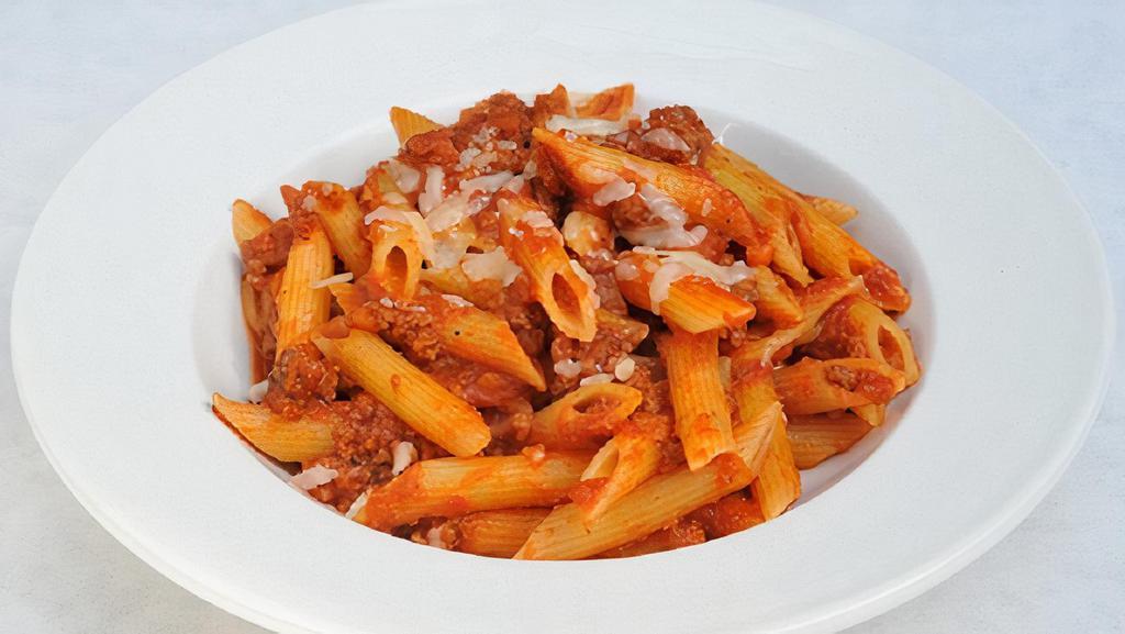 Pasta Alla Bolognese · Rigatoni Pasta in our in house meat Bolognese sauce topped with fresh basil and grated parmesan cheese.