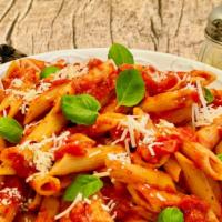 Pasta Marinara · Rigatoni Pasta in our in house marinara sauce topped with fresh basil and grated parmesan ch...