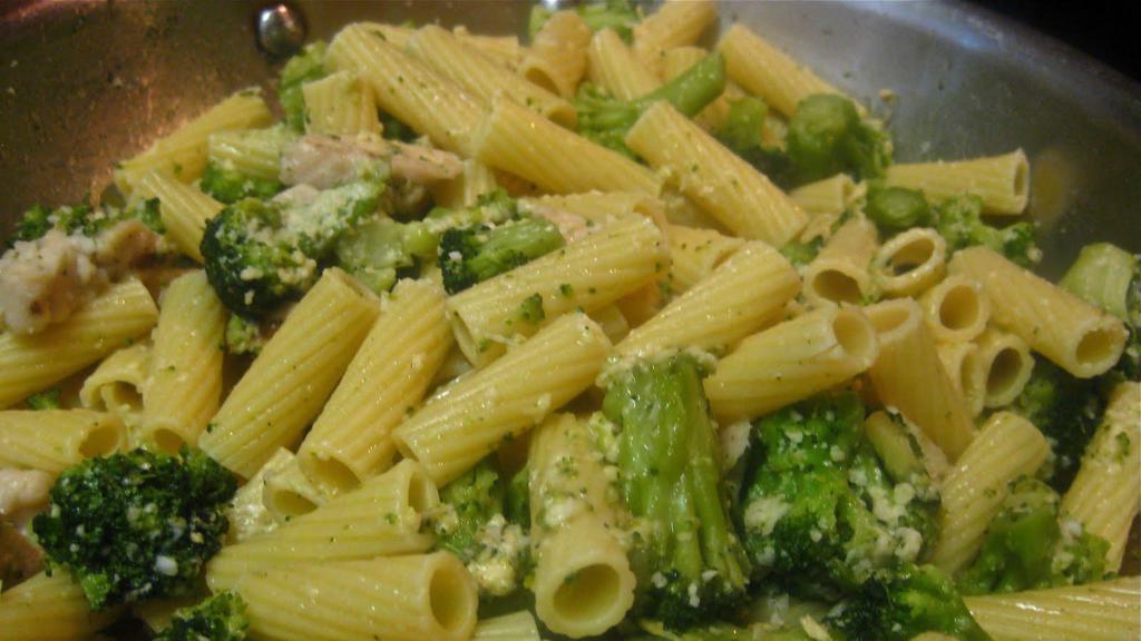 Pasta With Broccoli · Rigatoni Pasta in garlic and olive oil, with sautéed heads of broccoli, topped with fresh basil and grated parmesan cheese.