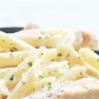 Pasta With Chicken Alfredo · Rigatoni Pasta in our house alfredo sauce, garlic, shallots, bacon bits, parmesan cheese and...