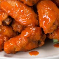 Buffalo Wings · Our buffalo wings are a perfect mix of crispy, tender, and saucy, 10 to an order, sauces ava...