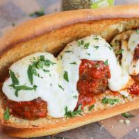 Meatball Parmigiana · Meatballs in our in house marinara sauce topped with melted grilled house blend of three che...