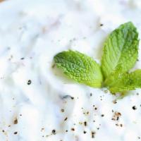 Tzatziki · Cucumber yogurt mixed with mint, garlic, and lemon.