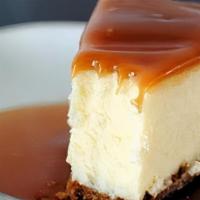 New X-Large Butterscotch Cheesecake Slice · This smooth cheesecake is topped with delicious, sugary and creamy butterscotch