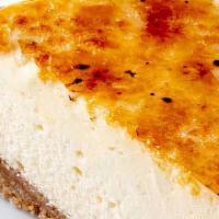 X-Large Creamy Vanilla Creme Brulee Cheesecake Slice · Calling all cheesecake fans! This Creme Brûlée Cheesecake is super creamy, super thick and s...