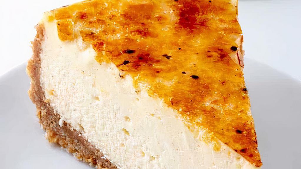 X-Large Creamy Vanilla Creme Brulee Cheesecake Slice · Calling all cheesecake fans! This Creme Brûlée Cheesecake is super creamy, super thick and super delicious!