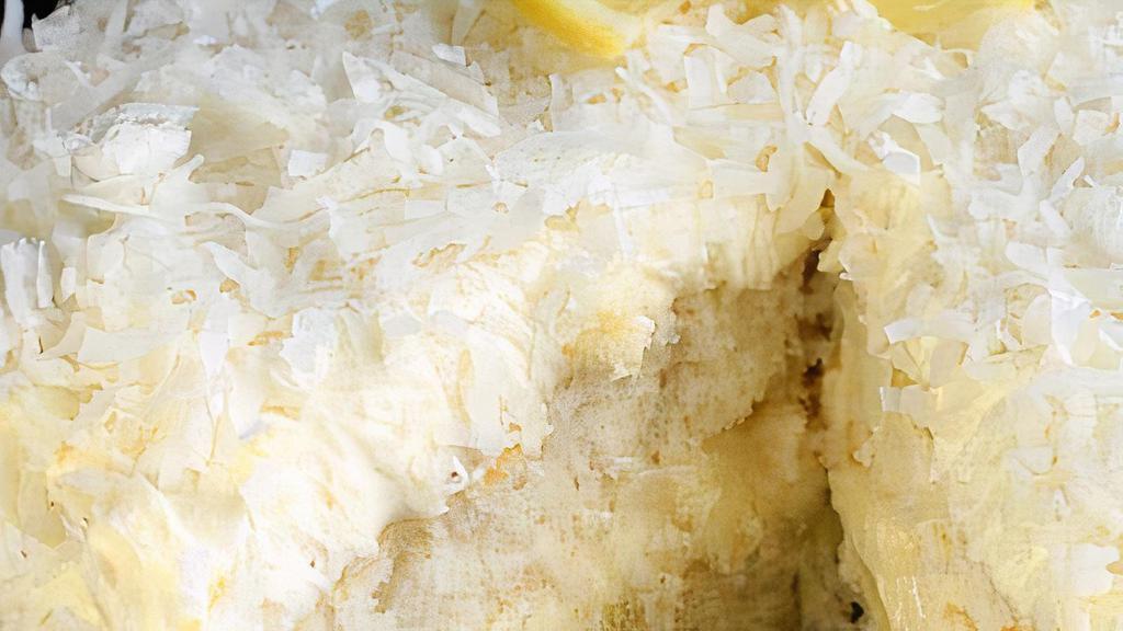 Whole Coconut Lemon Cake · Sour yet so delicious Moist, flavorful homemade Lemon Coconut Cake! A homemade loaf cake bursting with lemon and coconut flavor that’s topped with a lemon cream cheese frosting and shredded coconut.