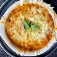 French Onion Soup · Caramelized onions, garlic, red wine, 