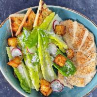 Caesar Salad · Choice of organic five spice tofu or pan seared chick’n
Romaine, baby radishes, smoked papri...