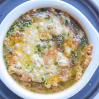 French Onion Soup  · Caramelized onions, garlic, red wine, 