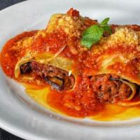 Eggplant Lasagna · Hand rolled lasagna, roasted eggplant, herb “ricotta,” Impossible meat, marinara sauce, “moz...