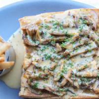 Philly Cheesesteak  · Sliced seitan, grilled onions, oyster mushrooms, melted 