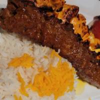 Koobideh Kebab · Two skewers of grilled seasoned ground beef and lamb.White or brown rice does not come with ...