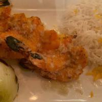 Jumbo Shrimp · Wood charcoal grilled jumbo shrimp topped with lemon-garlic sauce. White or brown rice does ...