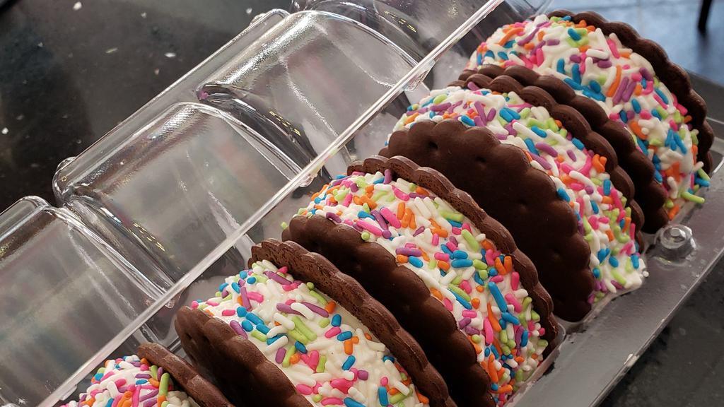 Classic Six · Alpine Vanilla Frozen Yogurt Sandwiched Between Two Delicious Chocolate Wafer Cookies Rolled In Rainbow Sprinkles