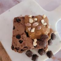 Brownie Bombshell · A Warm Brownie with Chocolate Covered Caramel Turtles Drizzled with Ghirardelli Caramel and ...