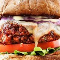 Veggie Burger · Fresh grilled veggie patty topped with lettuce, tomatoes, onions, green peppers, Russian dre...