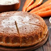 Carrot Cake · A slice of our decadent fresh baked warm spiced carrot cake.