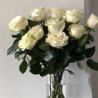 White Roses · 12 Premium white roses in a classic glass vase.