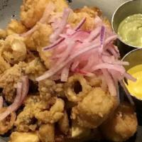 Jalea Plate · Fried seafood platter. Mixed seafood platter (cod, calamari, mussels, shrimp) deep-fried ove...