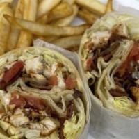Chicken Cutlet Wrap - With Fries · Breaded chicken with lettuce, tomatoes, and mayonnaise on a flour wrap