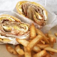 Turkey Wrap · Roasted turkey with Swiss cheese, lettuce, tomato and mayonnaise on a flour wrap