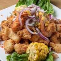 Jalea Ofelia · Included shrimp, calamari, fish, cassava, and onions / Camarones, calamares, pescados, yuca ...