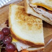 Sexy Honey Turkey, Bacon, & Cheddar Panini · Roasted, grilled turkey drizzled with honey, bacon and mild cheddar on our grilled Pompeii p...