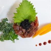 Tuna Tartar · Served with yuzu and arima pepper(from japan arima pepper only mottsu can get it now).
