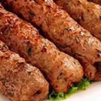 Lamb Kofta · A skewer of marinated lamb with our special blend of spices slowly grilled on charcoal.
