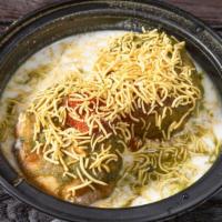 Dahi Vada · Lentil dumplings in yogurt topped with spicy and sweet chutneys.