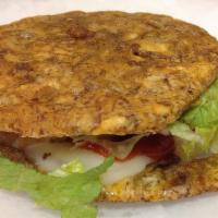 Patacones · Sandwich made without green plantains.