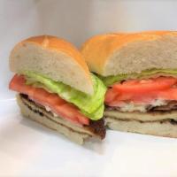 #27. California Club · Breaded chicken, applewood smoked bacon, lettuce, tomatoes and mayo.